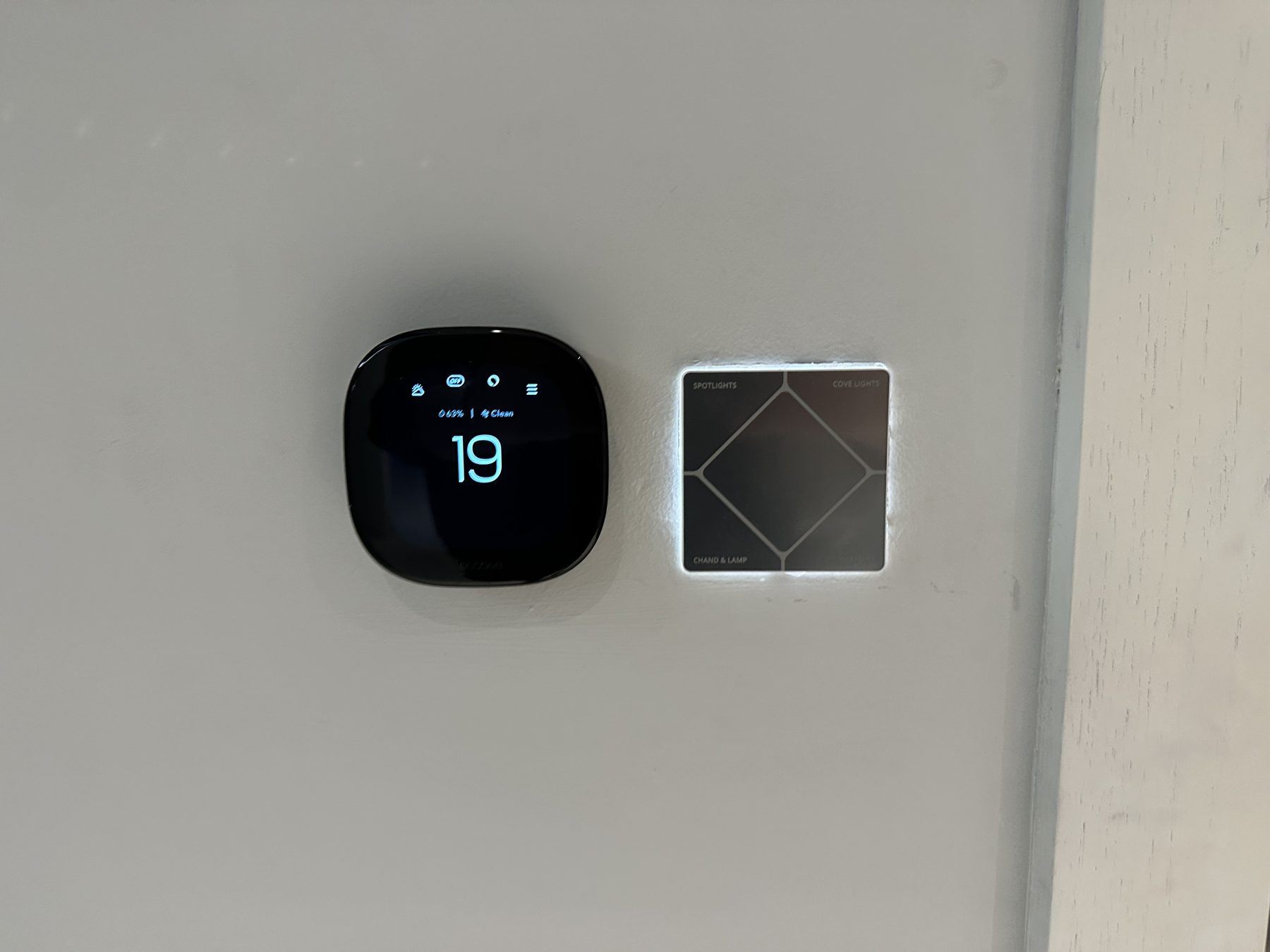 Thermostat and wall panel